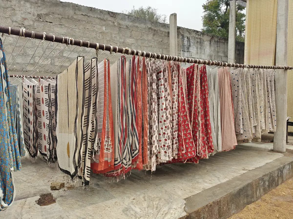 Block-printed fabrics drying in the sun near Jaipur