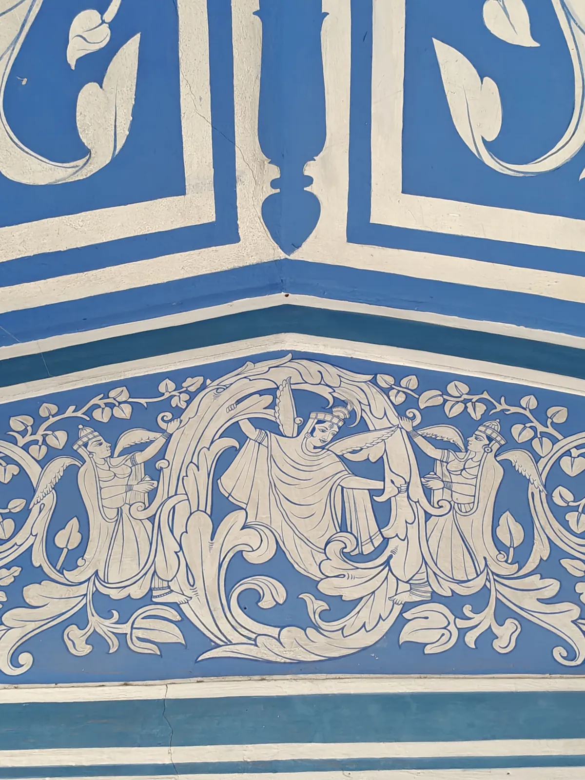 Detail of a blue fresco with painted figures, City Palace Jaipur