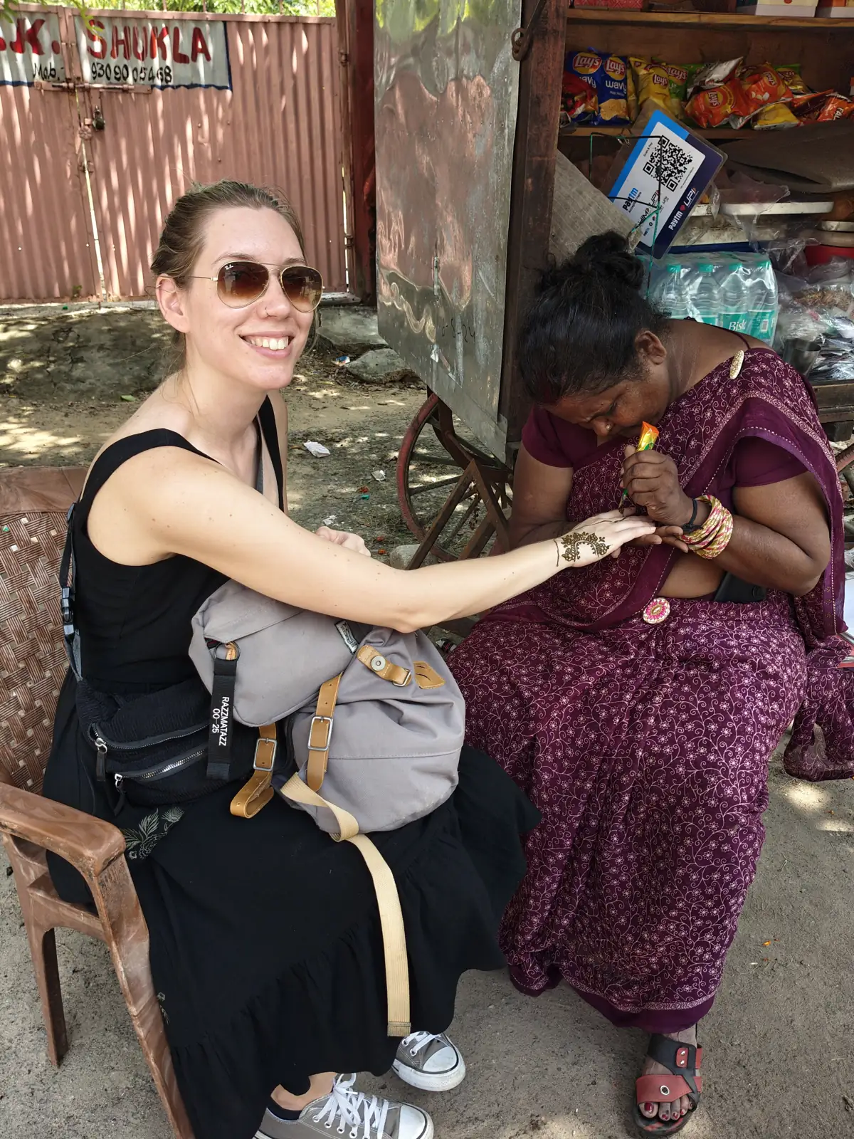 Guest getting henna done by a local artist in Jaipur
