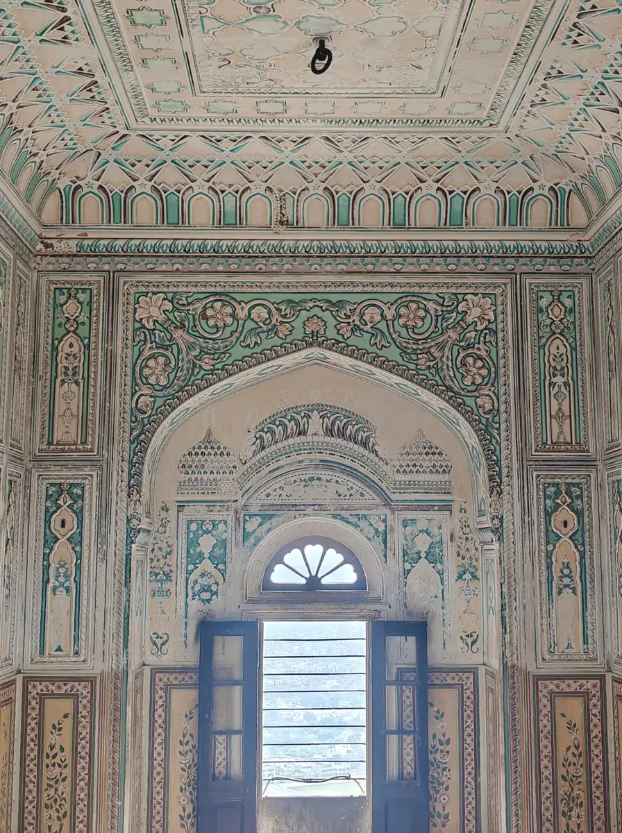 Painted room in Nahargarh Fort with a window over Jaipur